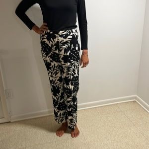 Black and white palm print trousers